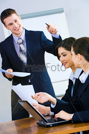 Image of successful man giving a report at business briefing, stock photo