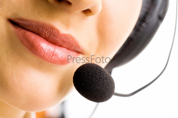 up of business woman\'s lips with microphone