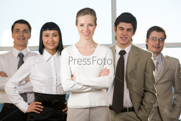 Portrait of friendly company with smart leader in the center