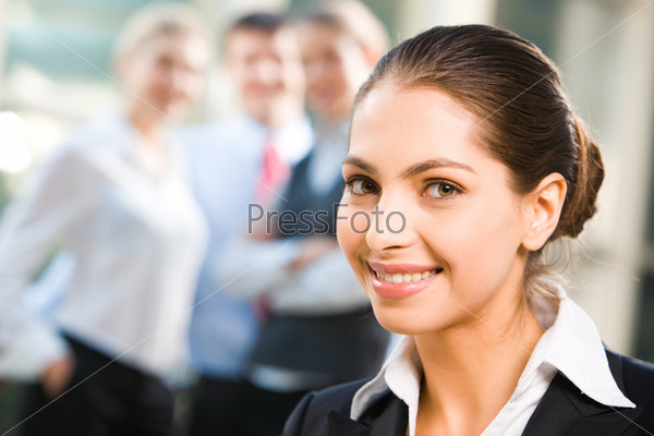 Attractive self-confident business lady with a happy smile