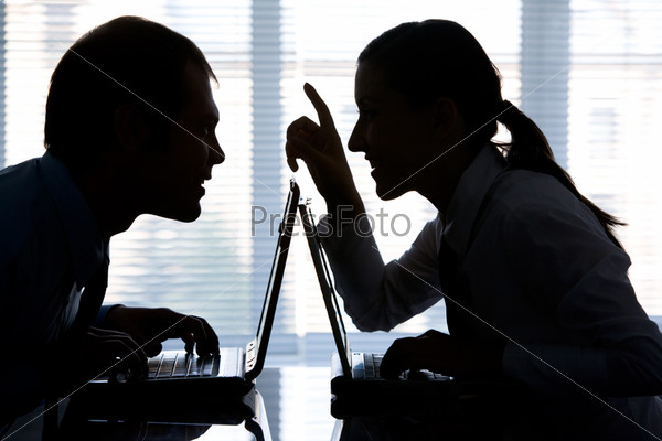 Outline of female sharing her idea with man in office