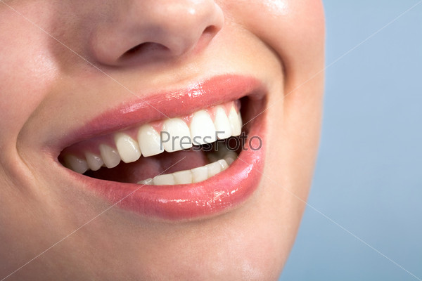 Close-up of happy female healthy teeth shown in smile