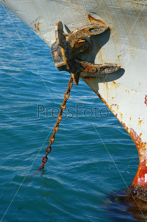 Rusty anchor and chain