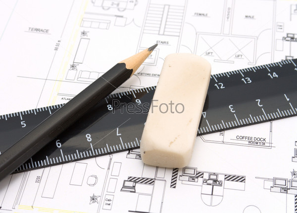 Ruler, eraser and a pencil on the floor plan - Bussines a still-life
