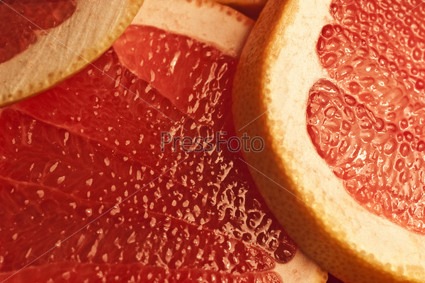 Parts of a  red grapefruit extreem close up