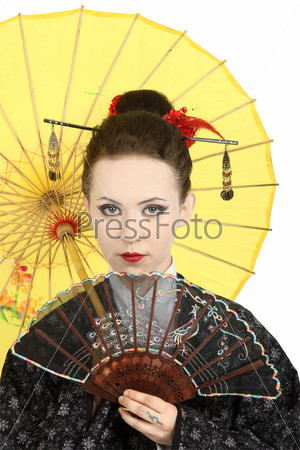 The Japanese geisha on a white background with a fan and an umbrella