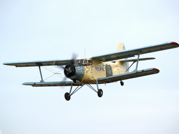 Old russian multipurpose plane on final approach
