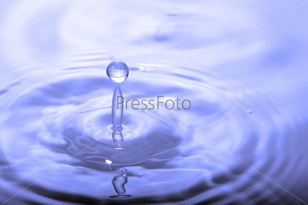 Drop falling on a water surface
