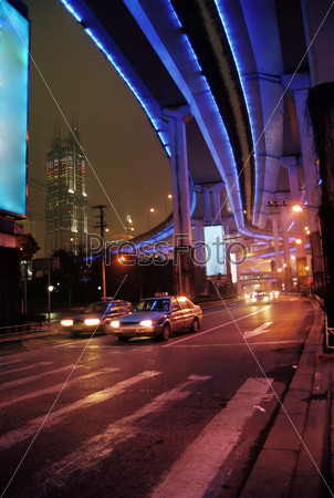 Shanghai street urban scene night illuminated streetlights