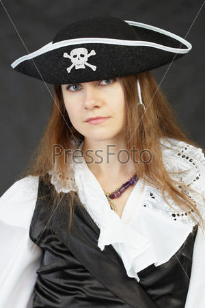 Portrait of a woman pirate on a black background