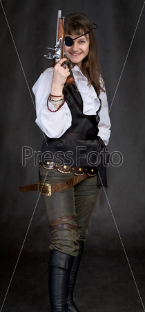 Girl - pirate with pistol in hand and eye patch on face