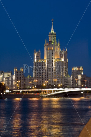 Russia, Moscow, night city. Old skyscraper