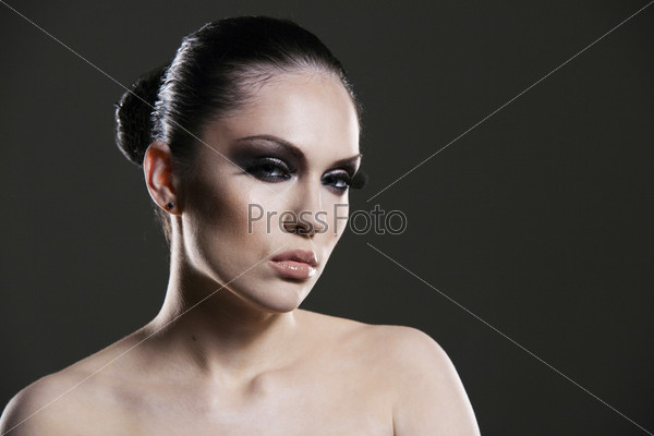 Beautiful woman portrait with professional make-up. Skin texture saved