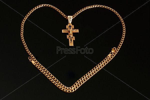 Gold chain with a cross and a crucifix