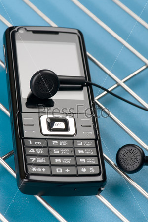 Mobile phone on blue background