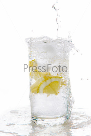 Image of glass with flowing out mineral water