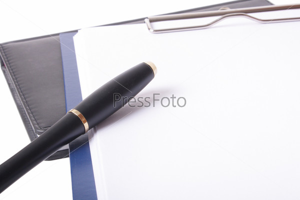 pen paper and notebook on white background
