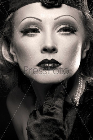 Woman\'s retro revival portrait. 30\'s of the XX century. Professional makeup