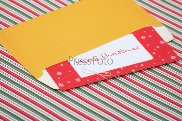 Letter to santa tucked in an envelope ready to send to the north pole