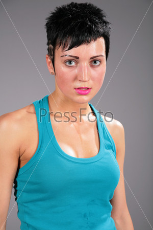 beauty young sweaty woman in blue t-shirt