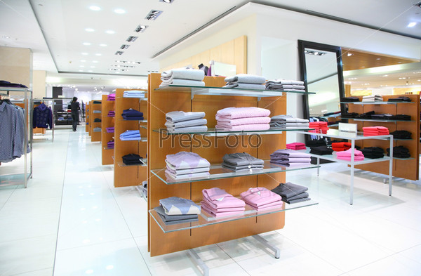 Clothing on shelves in store