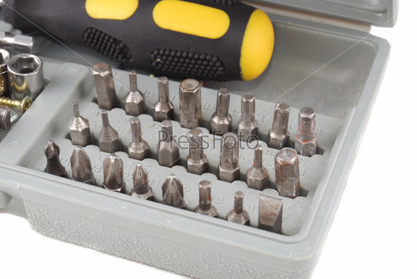 Metal screws and the manual tool for performance of works, stock photo