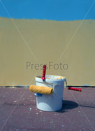Painting tools, bucket with a paint, platens
