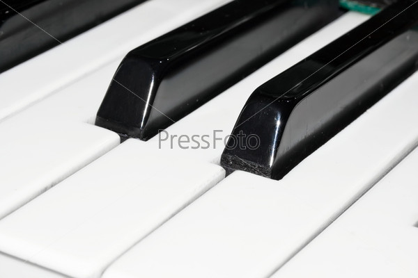 Closeup perspective view of a piano keyboard, stock photo