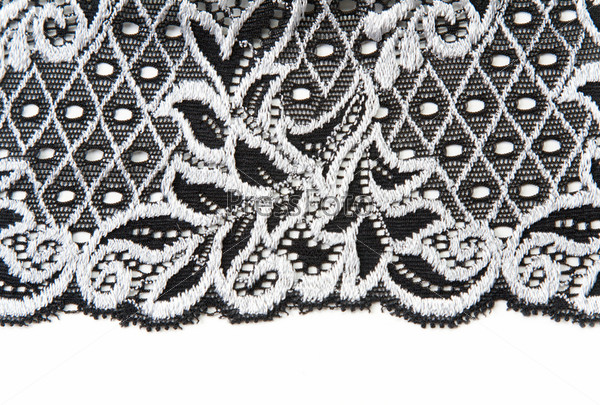 Black lace insulated on white background, stock photo
