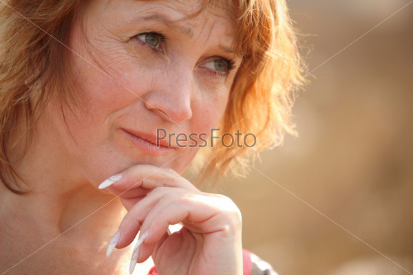 Thinking middleaged woman