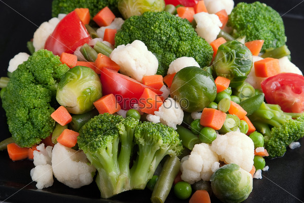 Vegetables: cauliflower, brussels sprouts, broccoli, carrots, string beans  and tomatoes