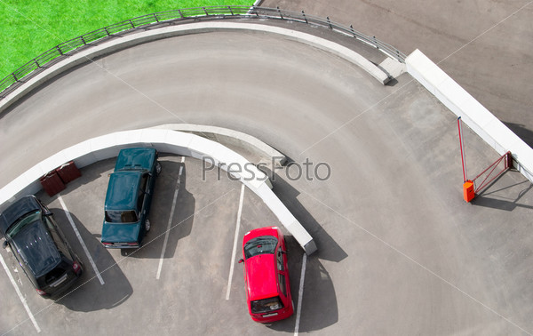 Car parking. There are also the barrier and the exit ramp.