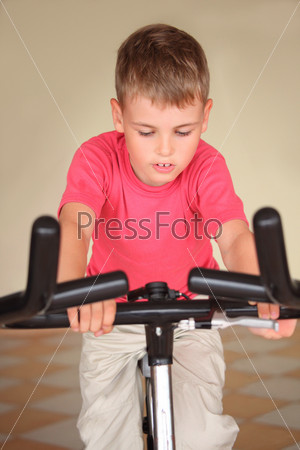 Boy on training apparatus