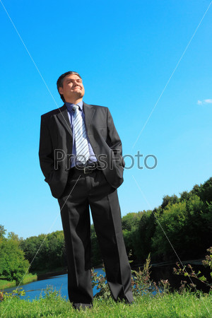 businessman outdoor in summer full body