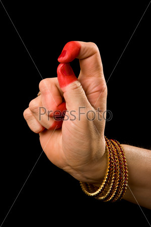 Woman hand showing Kapittha hasta (hand gesture, also called mudra) (meaning \