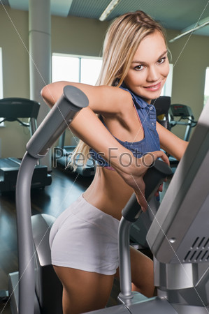 Beautiful blond girl at the health club