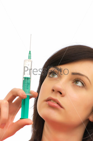Woman checking syringe isolated