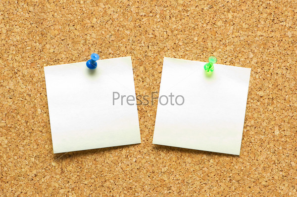 Yellow post it notes on the corkboard