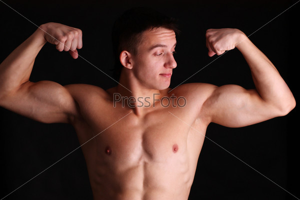 Studio portrait of a muscleman, beauty male body, stock photo