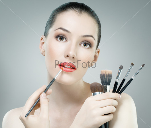a beauty girl on the grey background