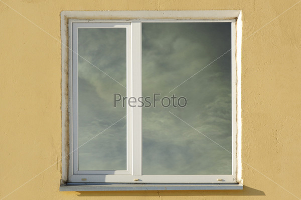 Image of window in the wall of house, stock photo