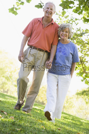 Senior couple on walk in countryside