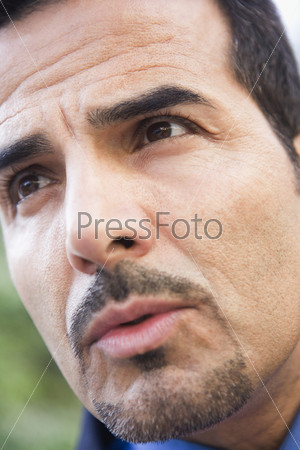 Close-up of businessman\'s face looking off camera