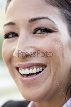 Close-up of woman laughing at camera