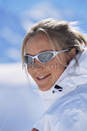Woman Outdoors In The Snow Smiling (Selective Focus)