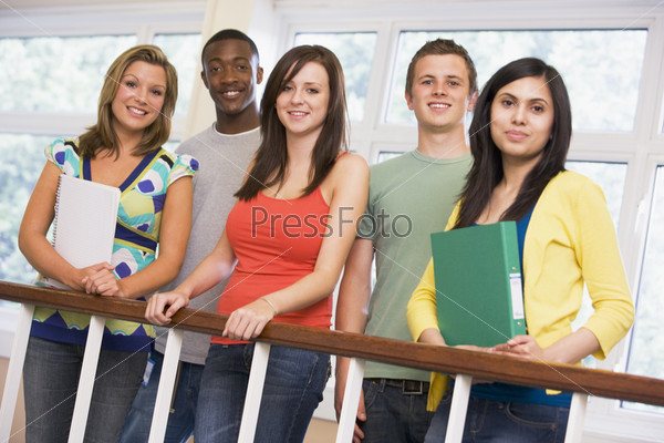 college students stood by staircase