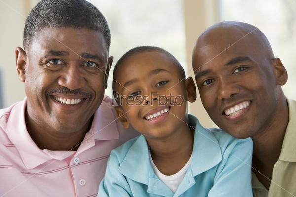 Grandfather with adult son and grandchild