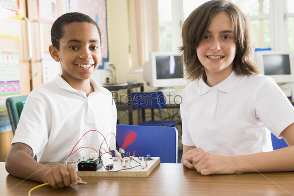 Students in class with electronic project