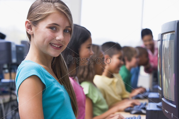 Female pupil in elementary school computer class