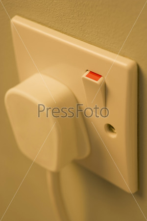 Electric Plug Connected To Outlet